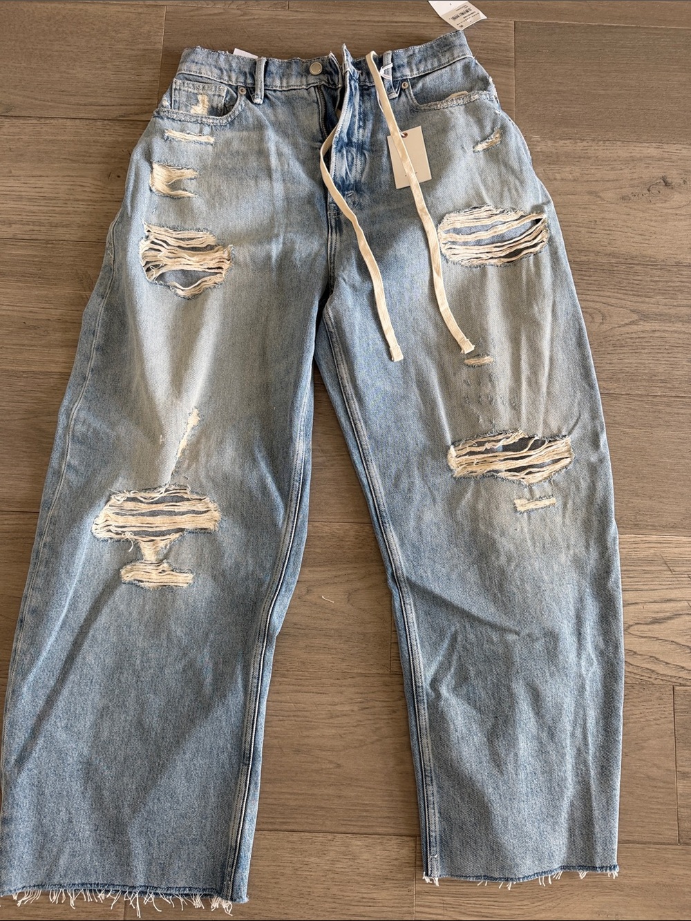 NWT Good American distressed barrel jean